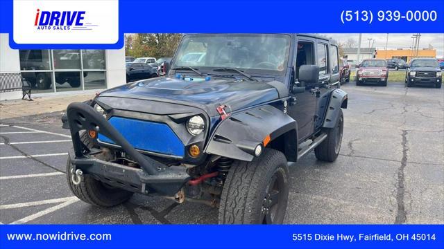 used 2013 Jeep Wrangler Unlimited car, priced at $16,500