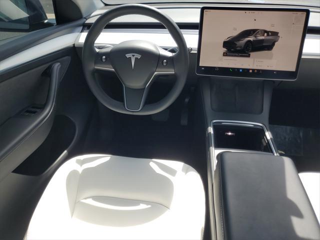 used 2023 Tesla Model Y car, priced at $25,487
