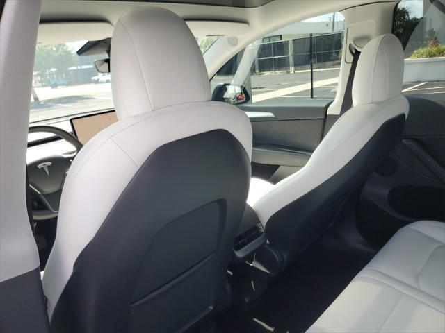 used 2023 Tesla Model Y car, priced at $25,487