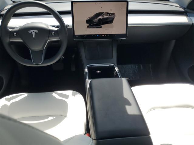 used 2023 Tesla Model Y car, priced at $25,487