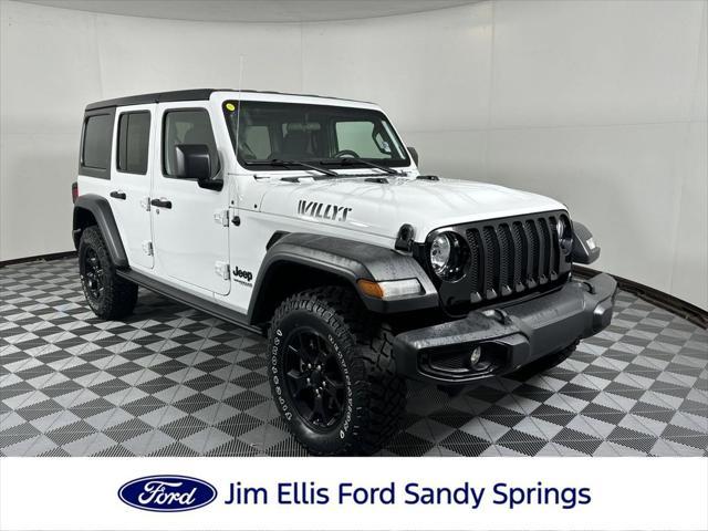 used 2021 Jeep Wrangler Unlimited car, priced at $31,640