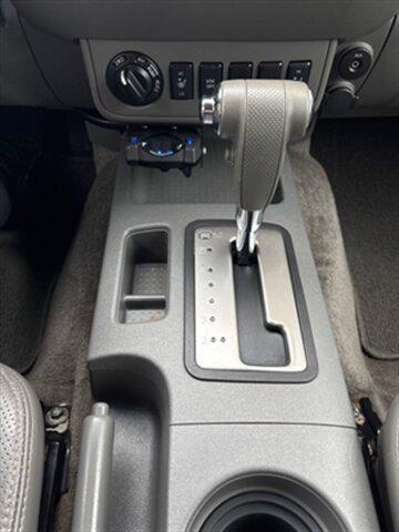 used 2010 Nissan Frontier car, priced at $12,355