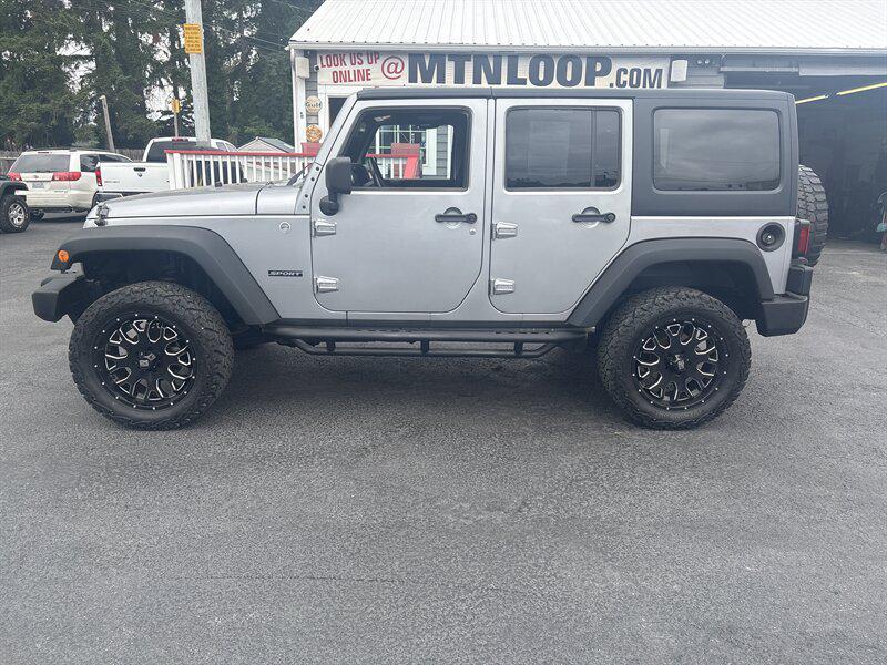 used 2013 Jeep Wrangler Unlimited car, priced at $14,999