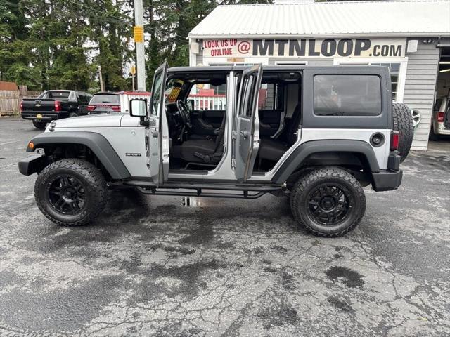 used 2013 Jeep Wrangler Unlimited car, priced at $14,999