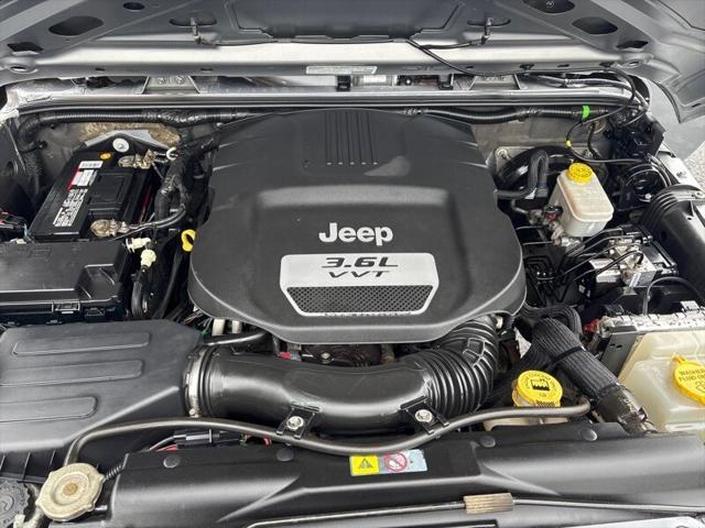 used 2013 Jeep Wrangler Unlimited car, priced at $14,999