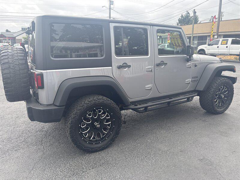 used 2013 Jeep Wrangler Unlimited car, priced at $14,999