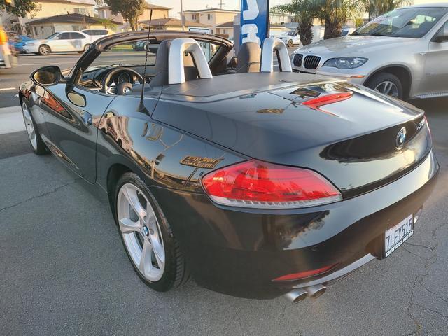 used 2011 BMW Z4 car, priced at $12,990