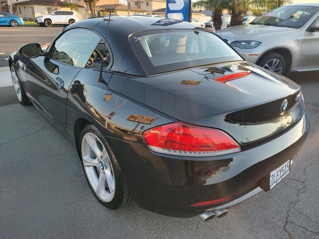 used 2011 BMW Z4 car, priced at $12,990