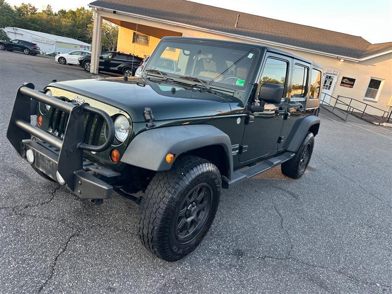 used 2010 Jeep Wrangler Unlimited car, priced at $12,995