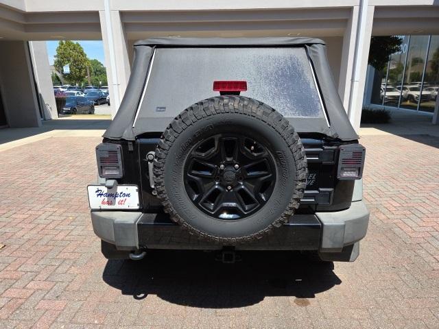 used 2014 Jeep Wrangler Unlimited car, priced at $15,988
