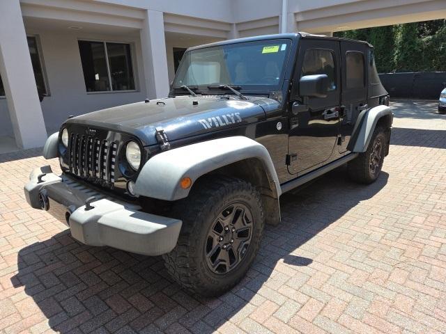 used 2014 Jeep Wrangler Unlimited car, priced at $15,988
