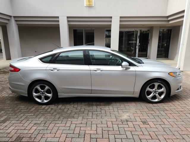 used 2014 Ford Fusion car, priced at $7,559