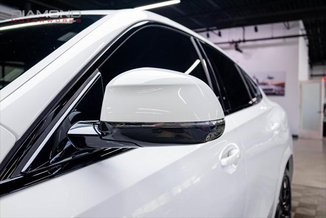used 2022 BMW X6 car, priced at $62,800