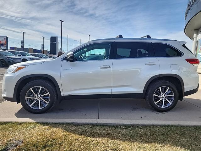 used 2019 Toyota Highlander Hybrid car, priced at $33,295