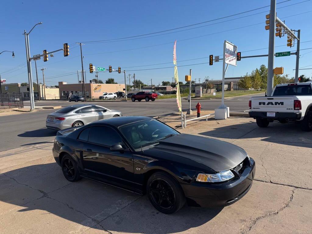 used 2002 Ford Mustang car, priced at $4,998