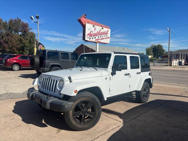 used 2014 Jeep Wrangler Unlimited car, priced at $16,988