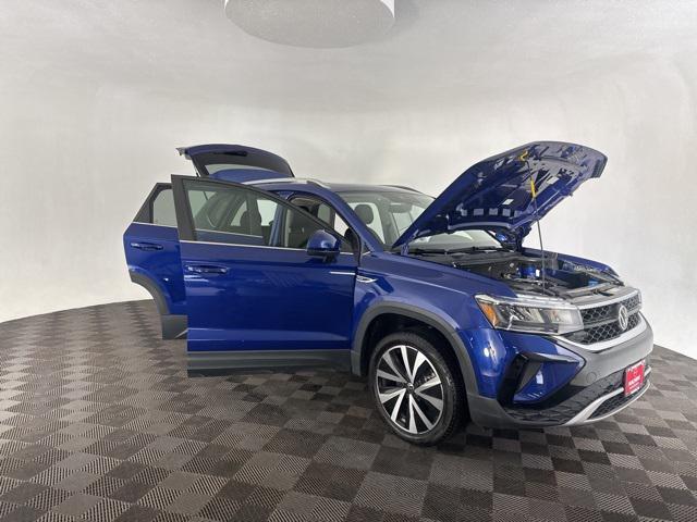 used 2023 Volkswagen Taos car, priced at $22,105