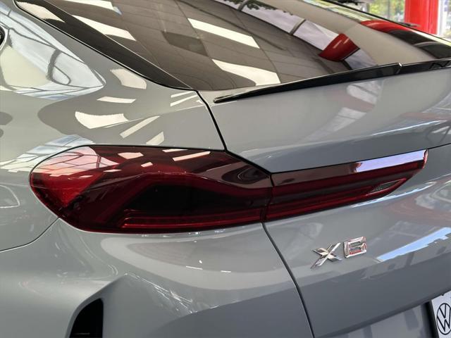 used 2024 BMW X6 car, priced at $61,995