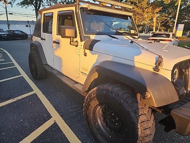 used 2011 Jeep Wrangler Unlimited car, priced at $13,295