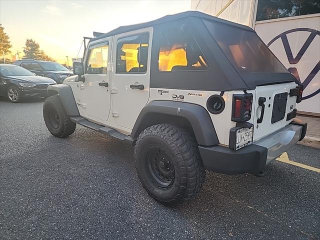 used 2011 Jeep Wrangler Unlimited car, priced at $13,295