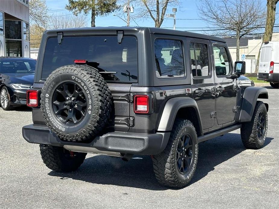 used 2021 Jeep Wrangler Unlimited car, priced at $29,395