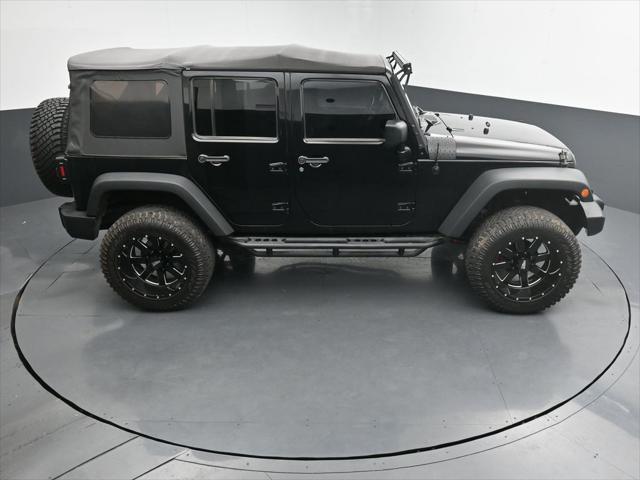 used 2014 Jeep Wrangler Unlimited car, priced at $18,800