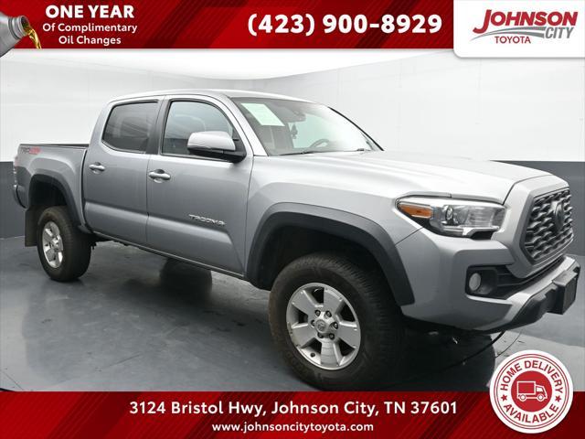 used 2021 Toyota Tacoma car, priced at $33,696