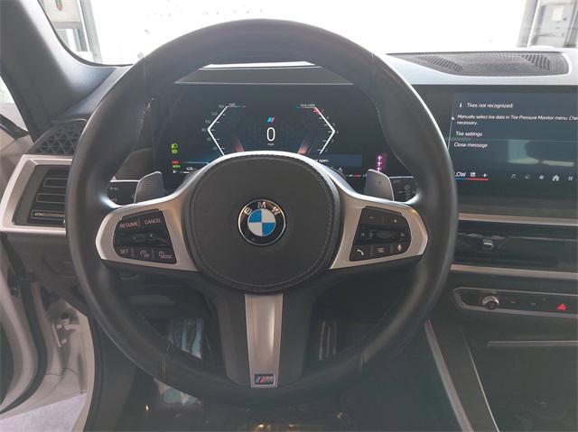 used 2024 BMW X5 car, priced at $64,899