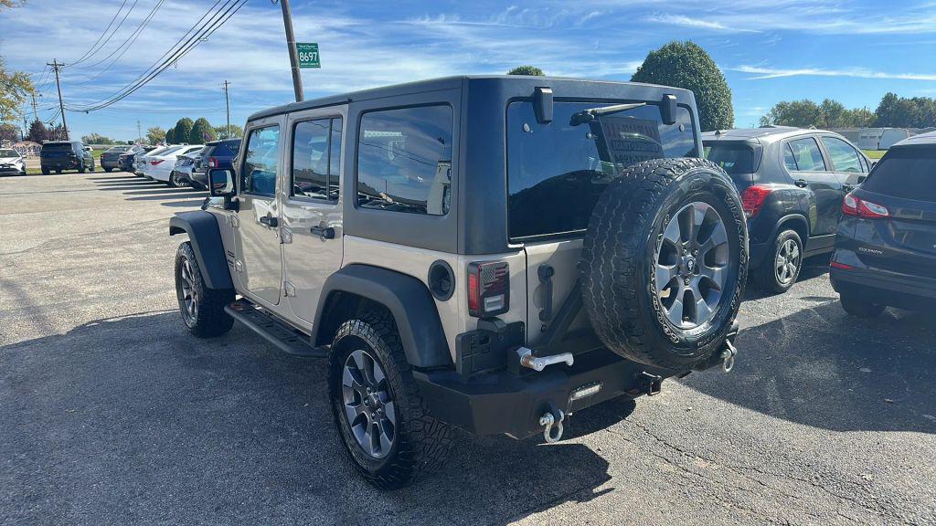 used 2016 Jeep Wrangler Unlimited car, priced at $17,779
