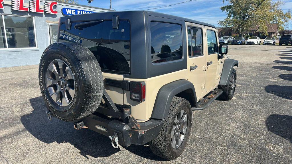used 2016 Jeep Wrangler Unlimited car, priced at $17,779