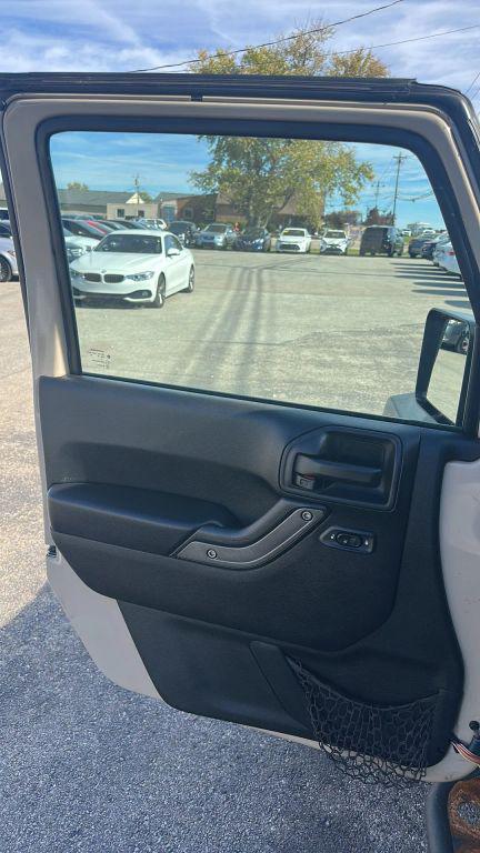 used 2016 Jeep Wrangler Unlimited car, priced at $17,779