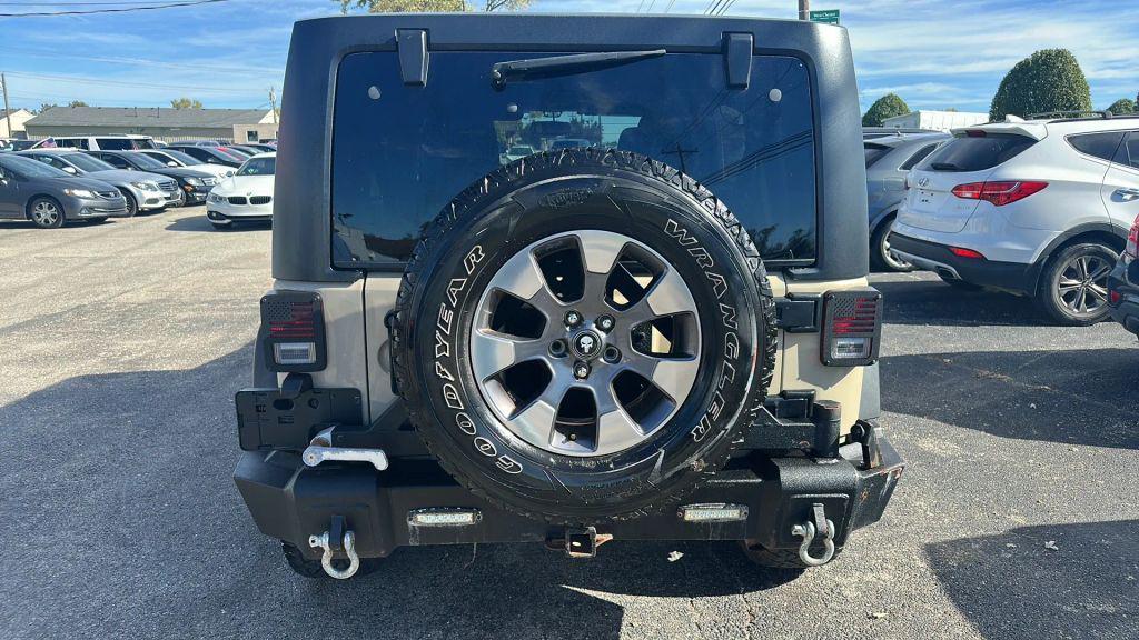 used 2016 Jeep Wrangler Unlimited car, priced at $17,779
