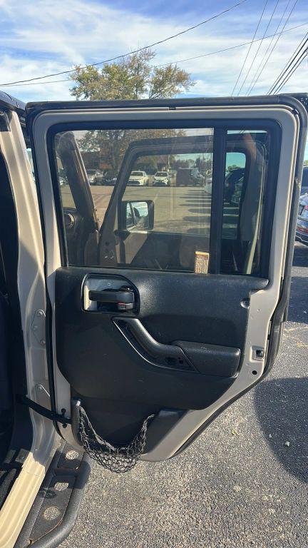 used 2016 Jeep Wrangler Unlimited car, priced at $17,779