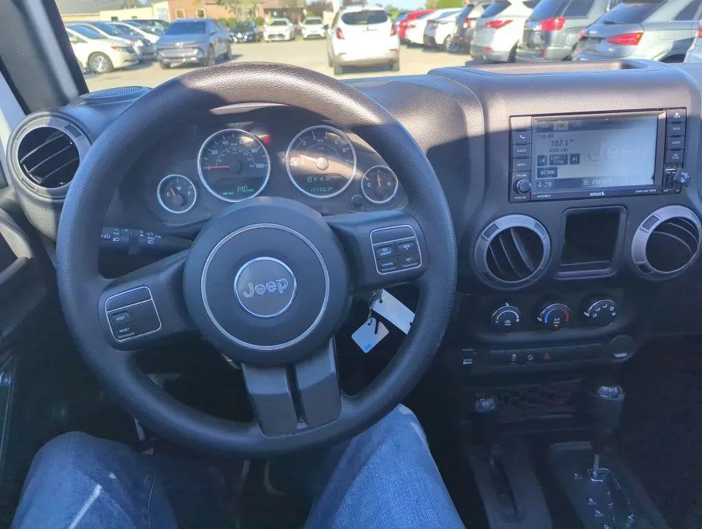 used 2015 Jeep Wrangler Unlimited car, priced at $10,995