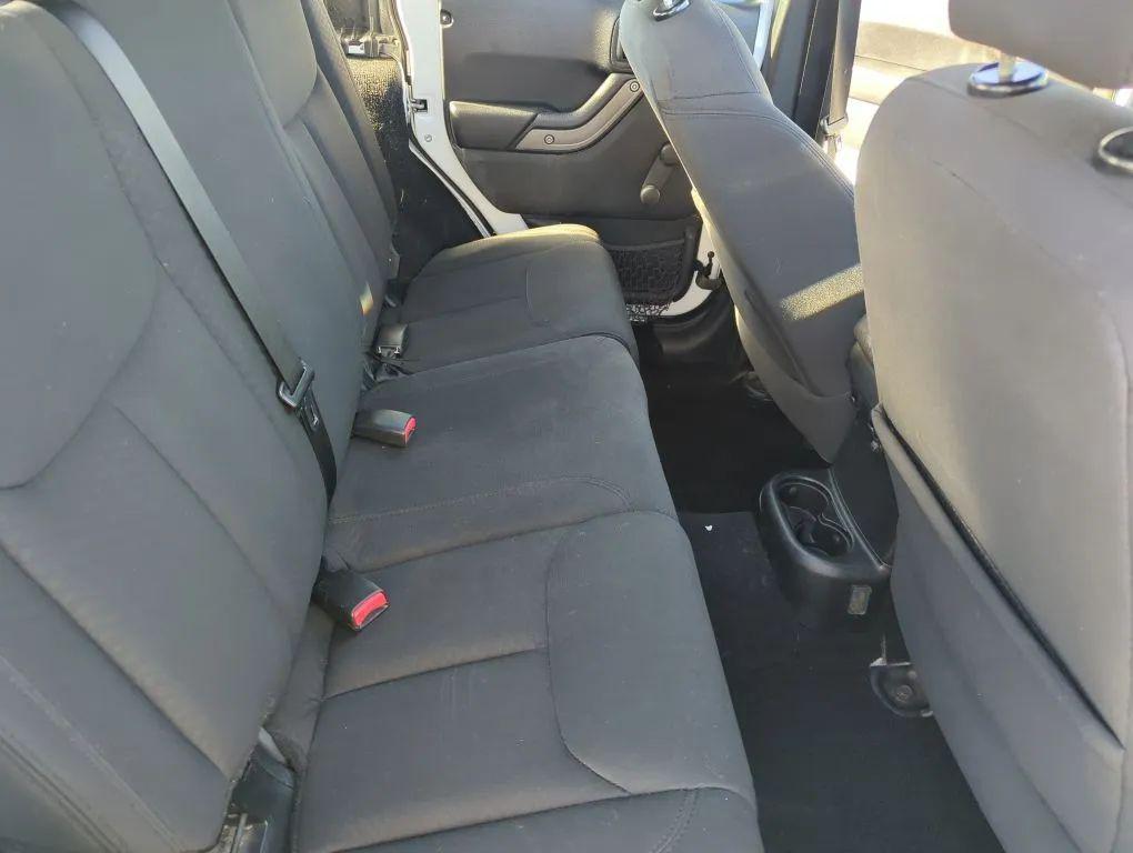 used 2015 Jeep Wrangler Unlimited car, priced at $10,995