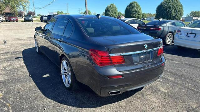 used 2015 BMW 750 car, priced at $17,995