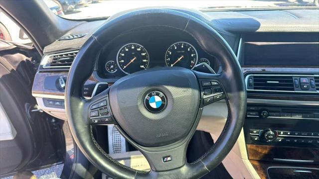 used 2015 BMW 750 car, priced at $17,995