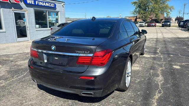 used 2015 BMW 750 car, priced at $17,995