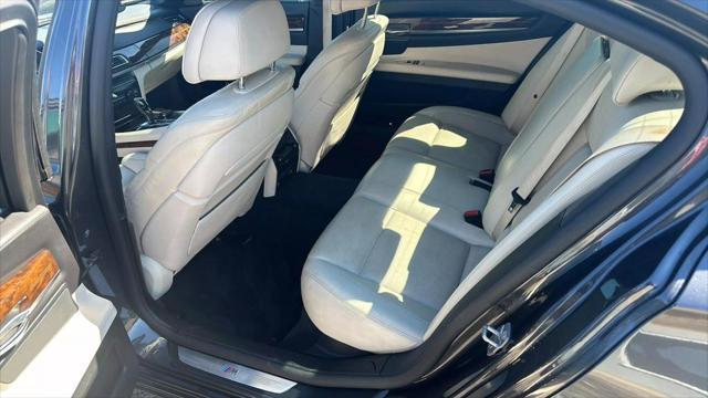 used 2015 BMW 750 car, priced at $17,995