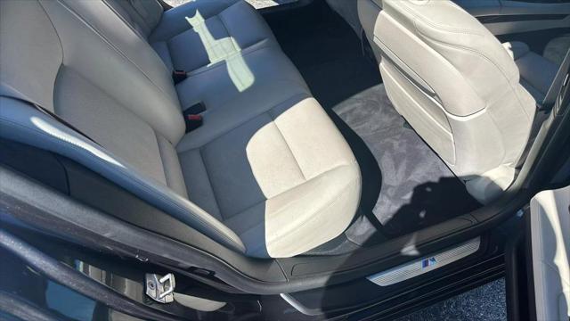 used 2015 BMW 750 car, priced at $17,995