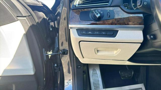 used 2015 BMW 750 car, priced at $17,995