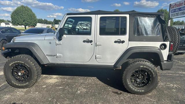 used 2011 Jeep Wrangler Unlimited car, priced at $12,495