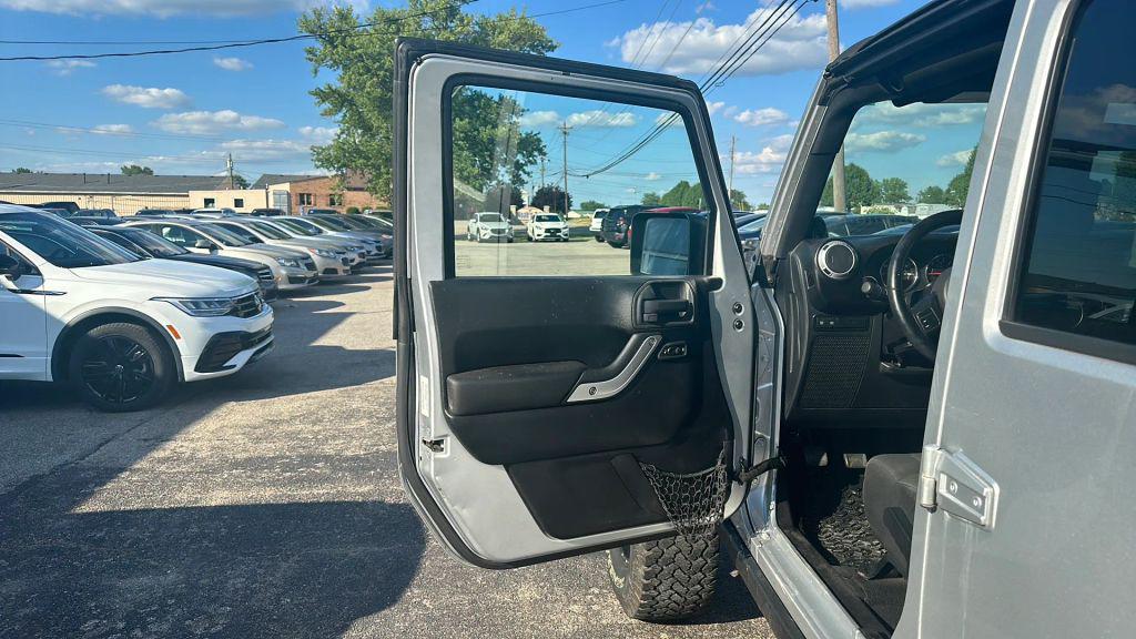 used 2011 Jeep Wrangler Unlimited car, priced at $12,995