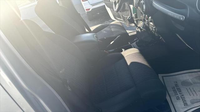 used 2011 Jeep Wrangler Unlimited car, priced at $12,495