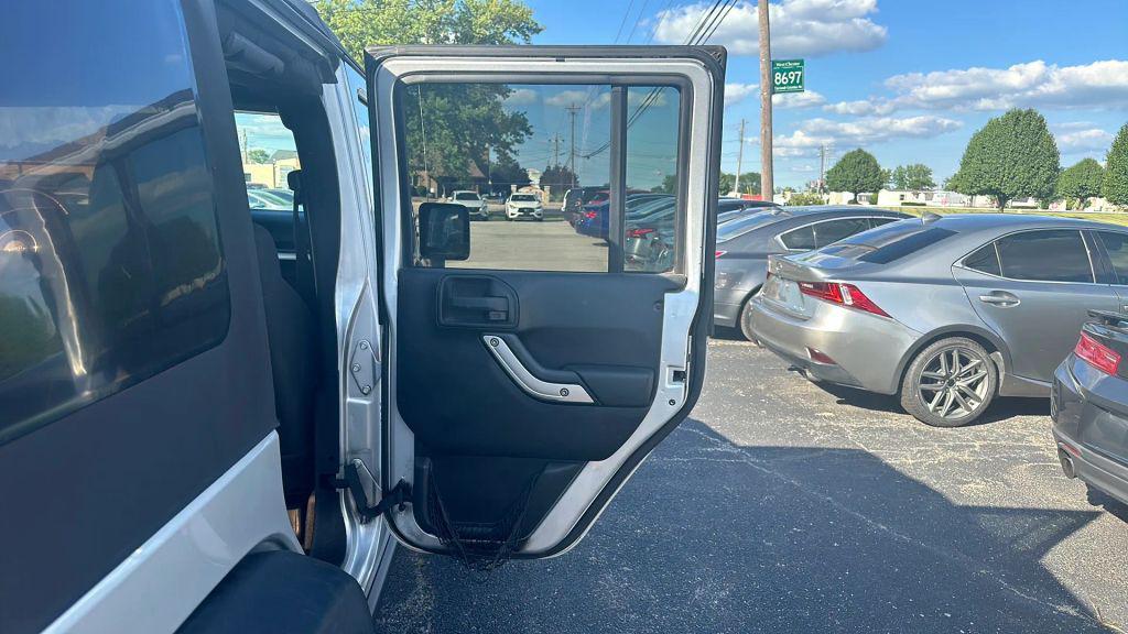 used 2011 Jeep Wrangler Unlimited car, priced at $12,995