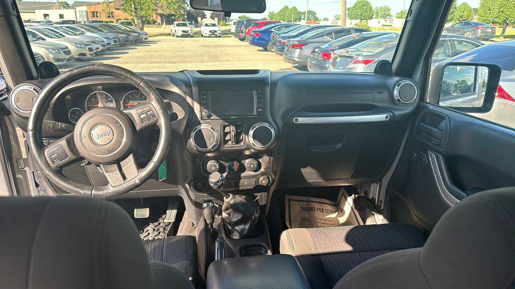 used 2011 Jeep Wrangler Unlimited car, priced at $12,995