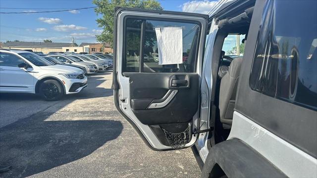 used 2011 Jeep Wrangler Unlimited car, priced at $12,495