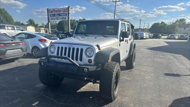 used 2011 Jeep Wrangler Unlimited car, priced at $12,495
