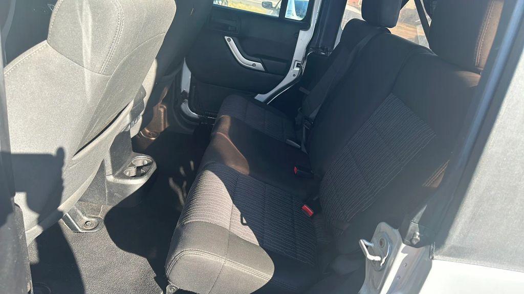 used 2011 Jeep Wrangler Unlimited car, priced at $12,995