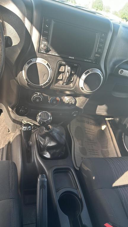 used 2011 Jeep Wrangler Unlimited car, priced at $12,495